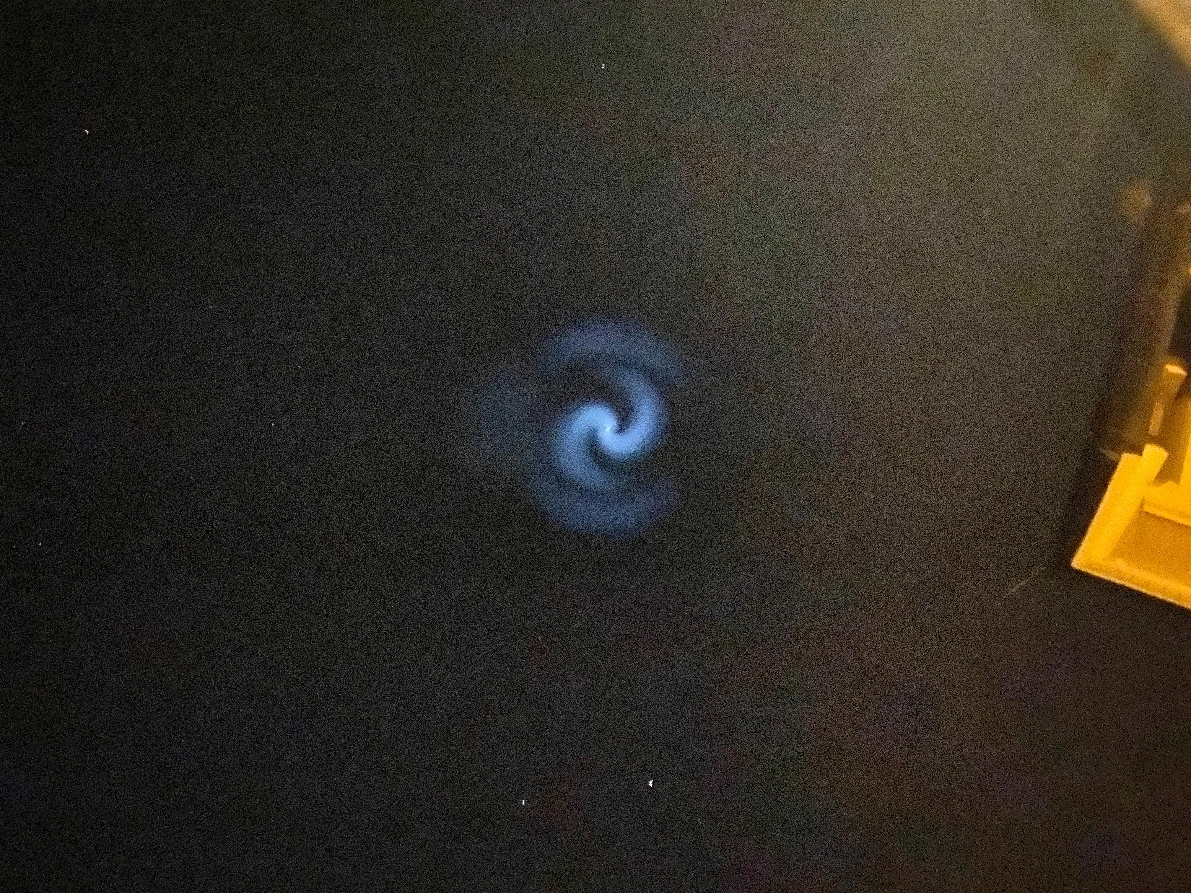 Luminous spinning sphere emits gases
