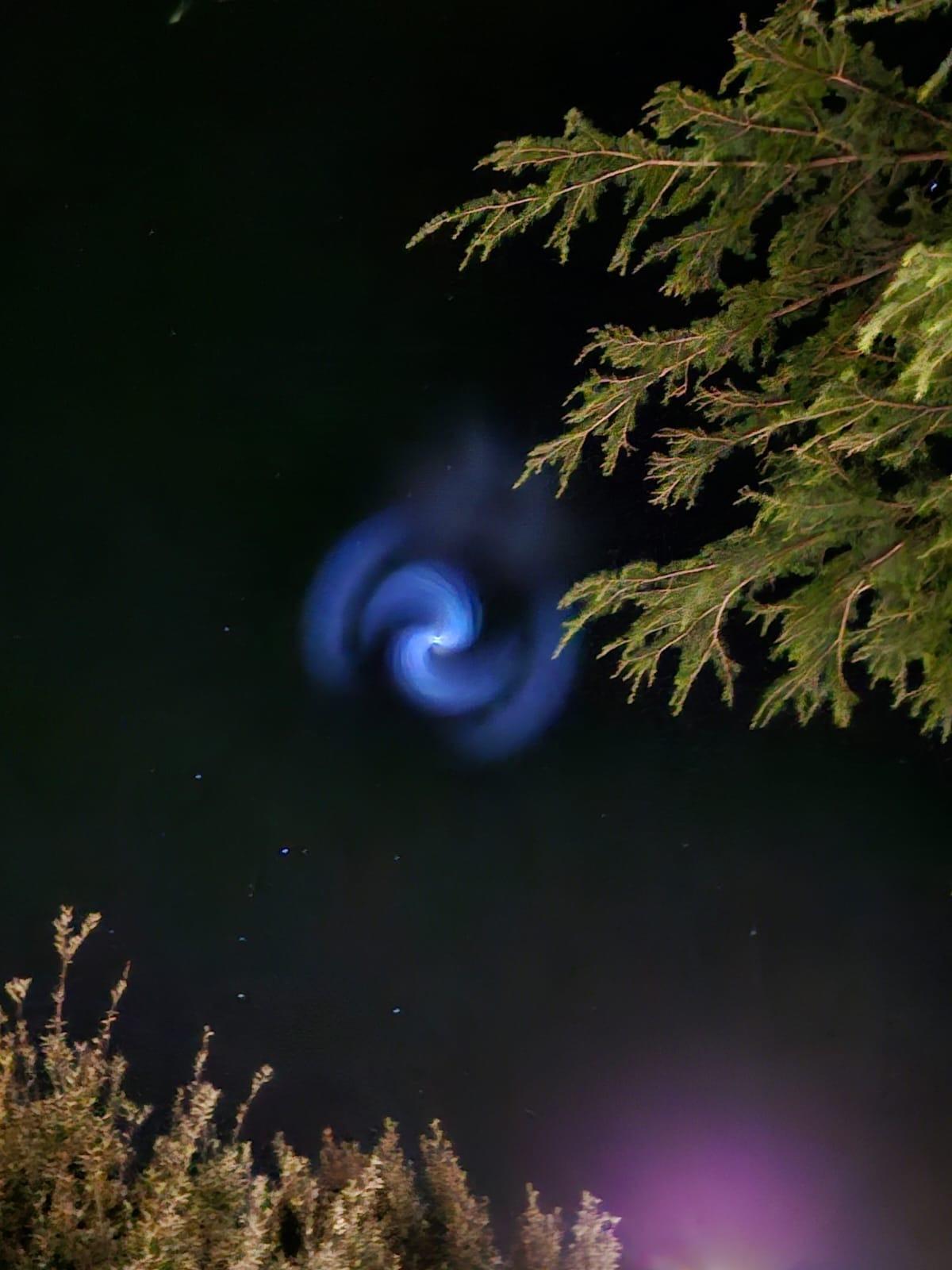 White glowing plane-like shape moving steadily